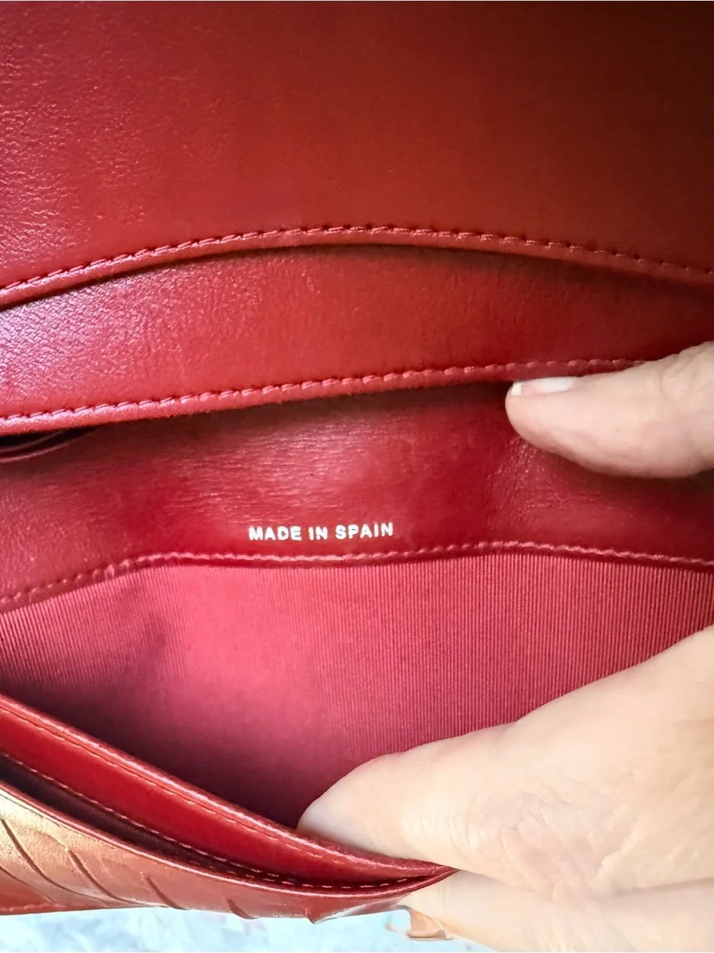 Authentic CHANEL Quilted Red Lambskin Leather Long Wallet with Silver CC Emblem.